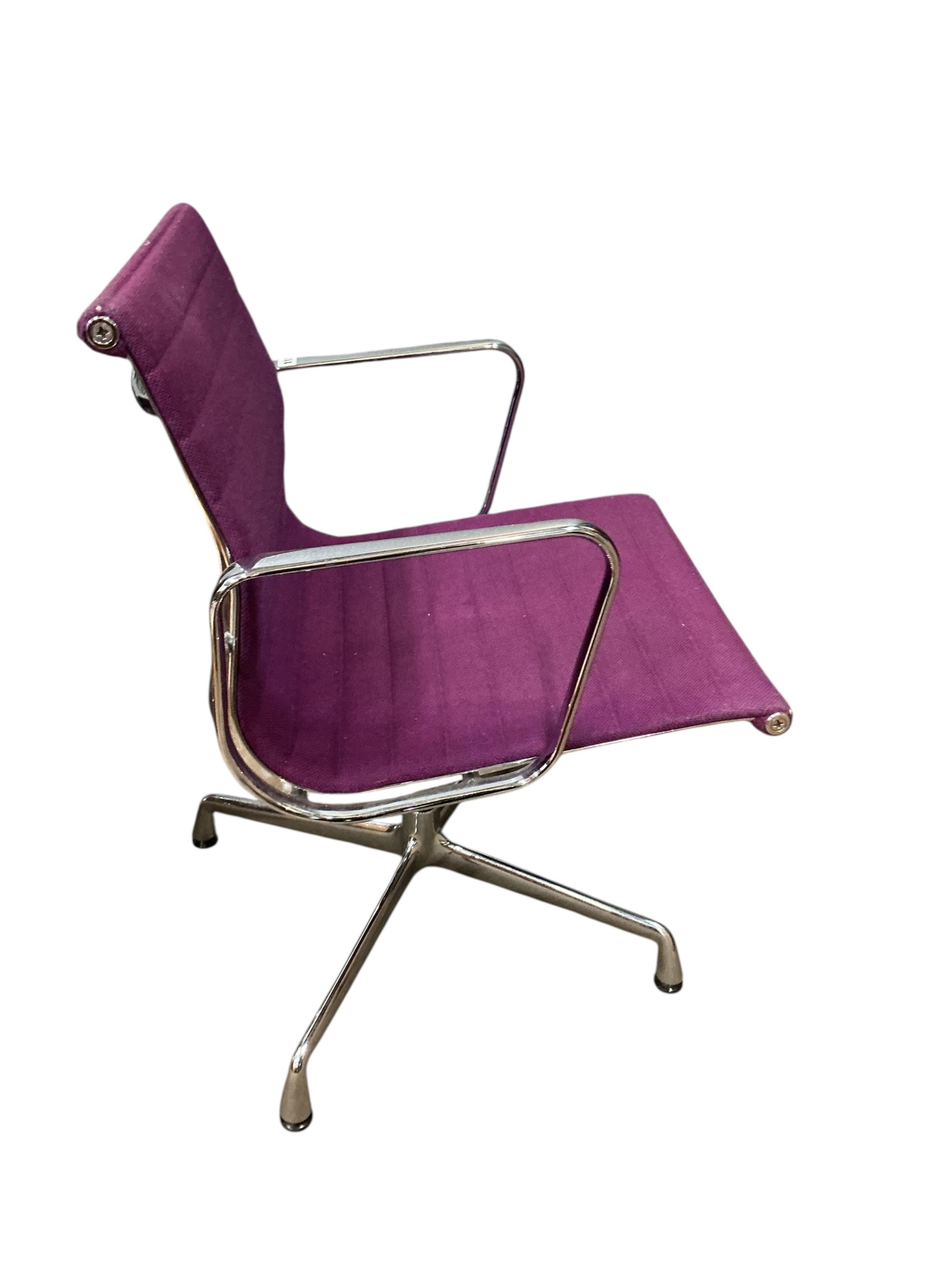 Charles Eames for Vitra, a chrome swivel desk chair on four prong base, width 57cm, depth 50cm, height 82cm